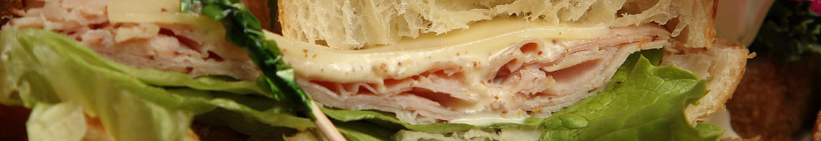 Eating Deli Sandwich at Carmen's Deli restaurant in Bellmawr, NJ.